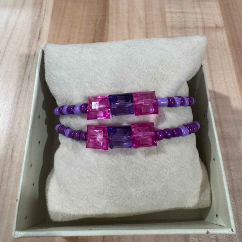 Matching set of two handmade purple and pink bracelets